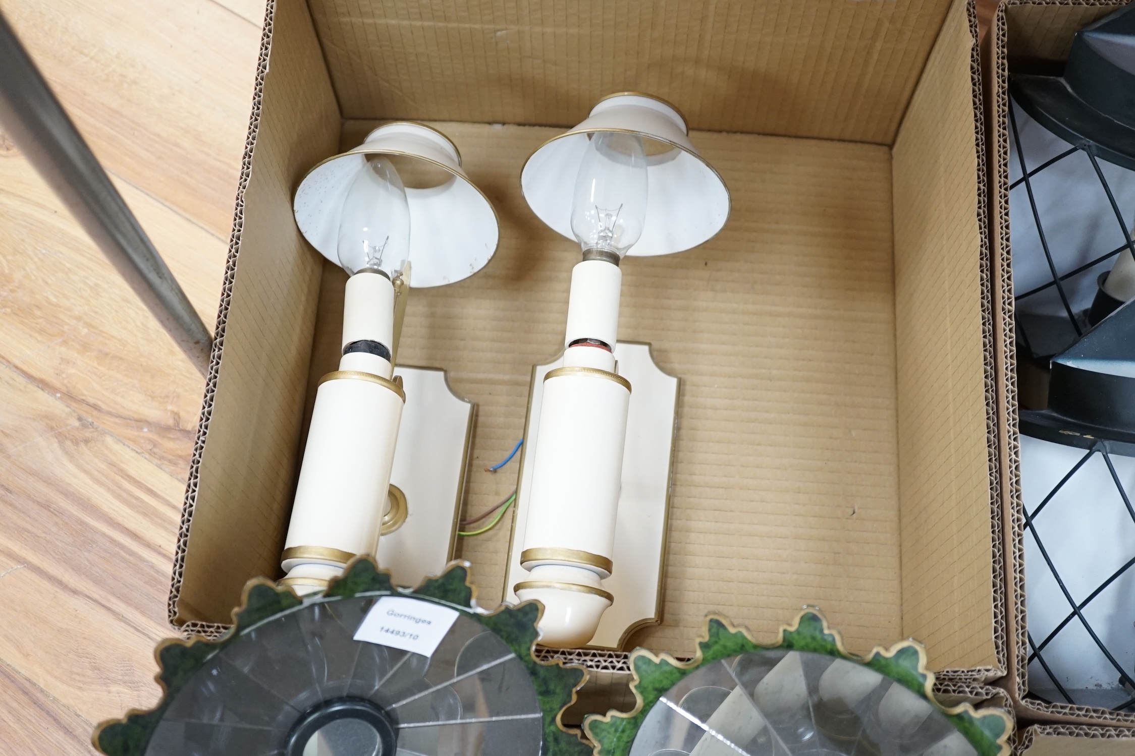 Twelve various lights: a lustre wall light, two branch chrome wall light, and glass shaded wall light, two pairs of toleware style wall lights and a similar ceiling and pair of plaster wall lights (12). Condition - fair